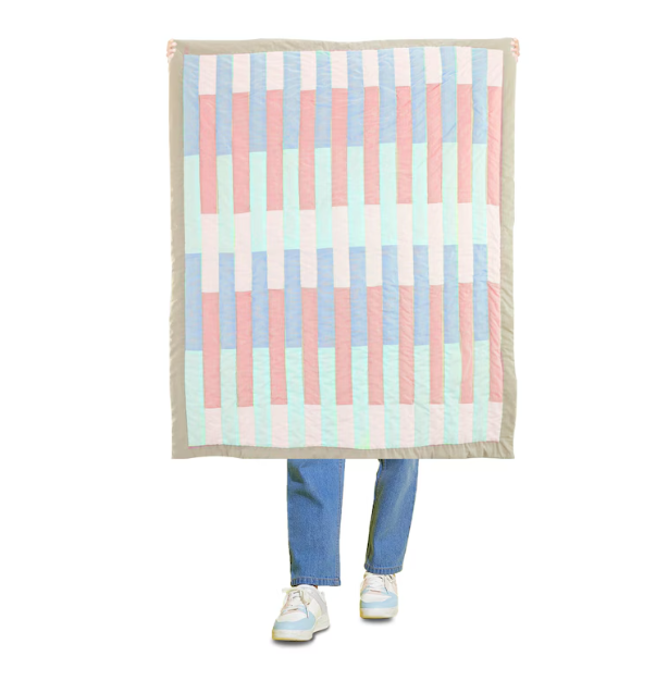 "Handcrafted geometric kids quilt in soft cotton—striped design for crib, toddler & twin beds. Custom-made cozy blanket for boys & girls."