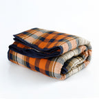 "Reversible cotton quilt for year-round comfort, lightweight for summer, cozy for winter, machine-washable, adds charm to modern or farmhouse décor."