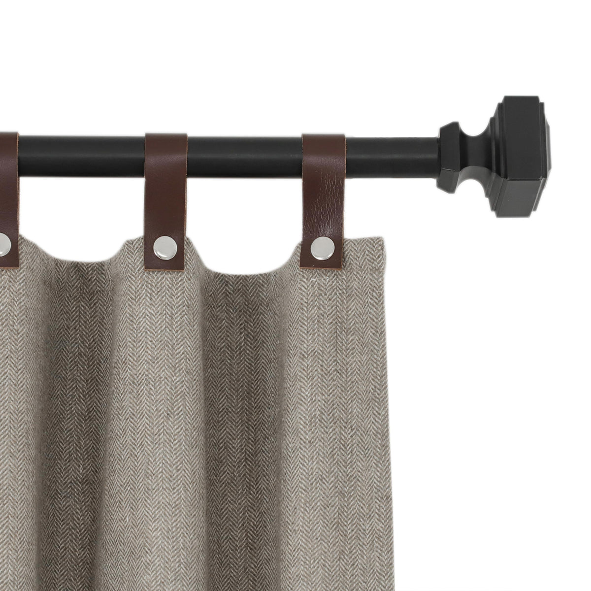 "Chevron wool curtains with snap-button leather tabs offer SPF 50+ UV protection, energy efficiency, and customizable light control."

