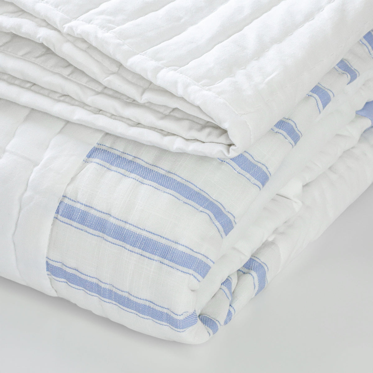 Handmade nursery quilt – a soft and breathable all-season blanket featuring striped cotton patchwork. Available in twin quilt queen and king sizes.
