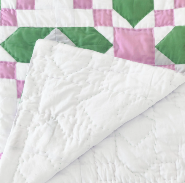 Handcrafted lightweight quilt for kids' rooms or dorms – a cozy, hypoallergenic, and stylish décor piece. Available in lap quilt, twin quilt, queen and king sizes.