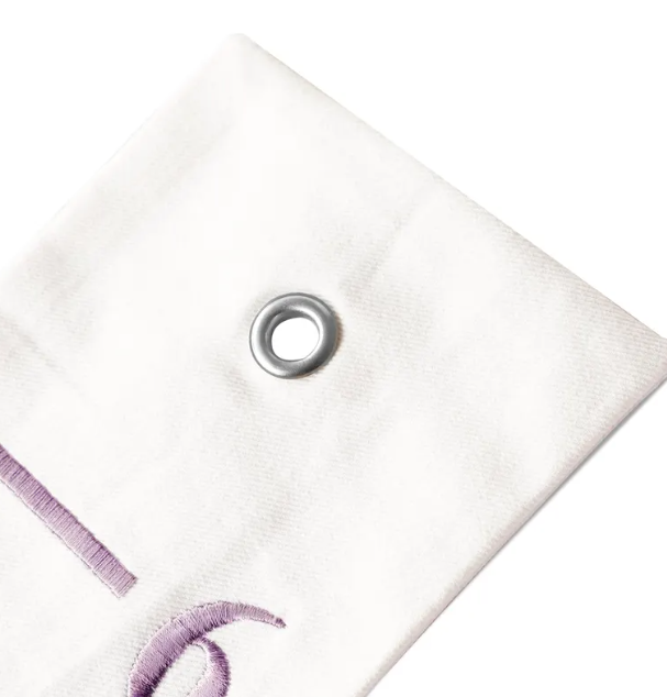 "Handmade fabric height ruler for nursery decor, featuring baby’s name and embroidered motifs as a keepsake growth tracker."