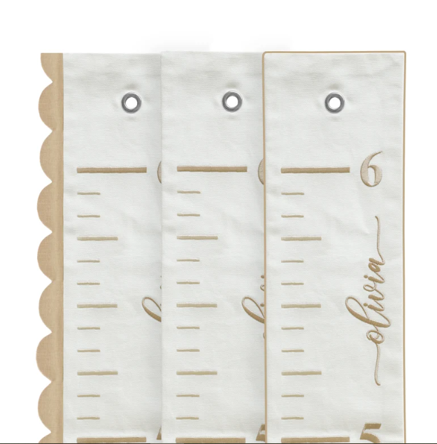 "Floral baby name height chart, embroidered on fabric, a personalized nursery keepsake to track your child’s growth over years."