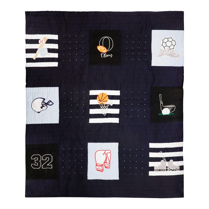 "Handcrafted sports quilt with applique designs for boys - perfect toddler or twin bedding gift for young athletes"