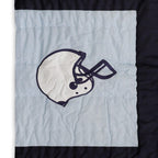 "Handcrafted toddler sports quilt - vibrant applique designs on cozy boys' bedding, perfect for little fans"